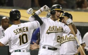 Semien reaches base 6 times, A’s roll past Rangers 12-3
